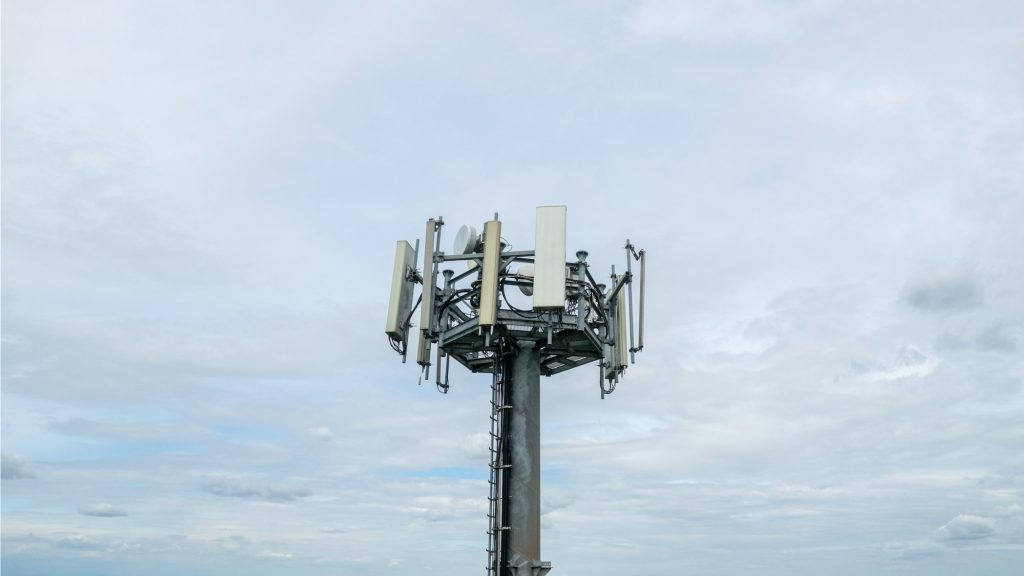 broadcast mobile 4g lte 5g antenna in a rural field in countryside