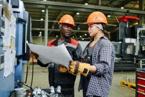 Discussing Construction Plans in Manufacturing Facility