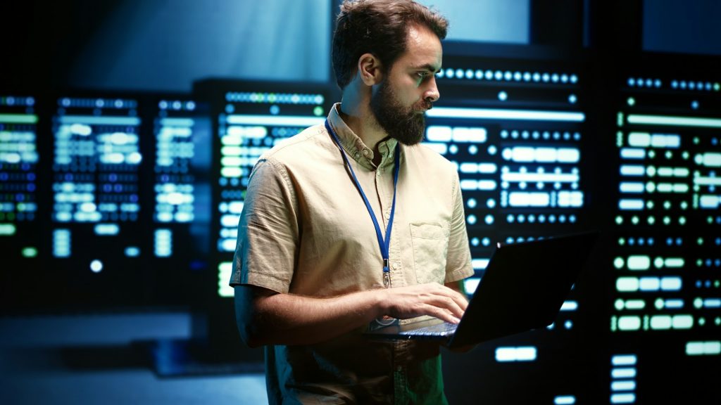 Technician checking server hub